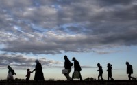 Hit by new wave of refugees, Germany warns EU partners
